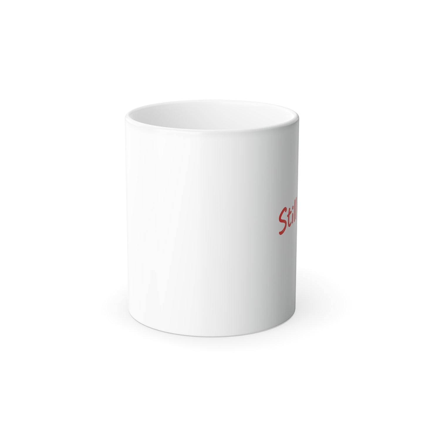White mug with romantic words ‘Still loving you’  written in red text on a white background