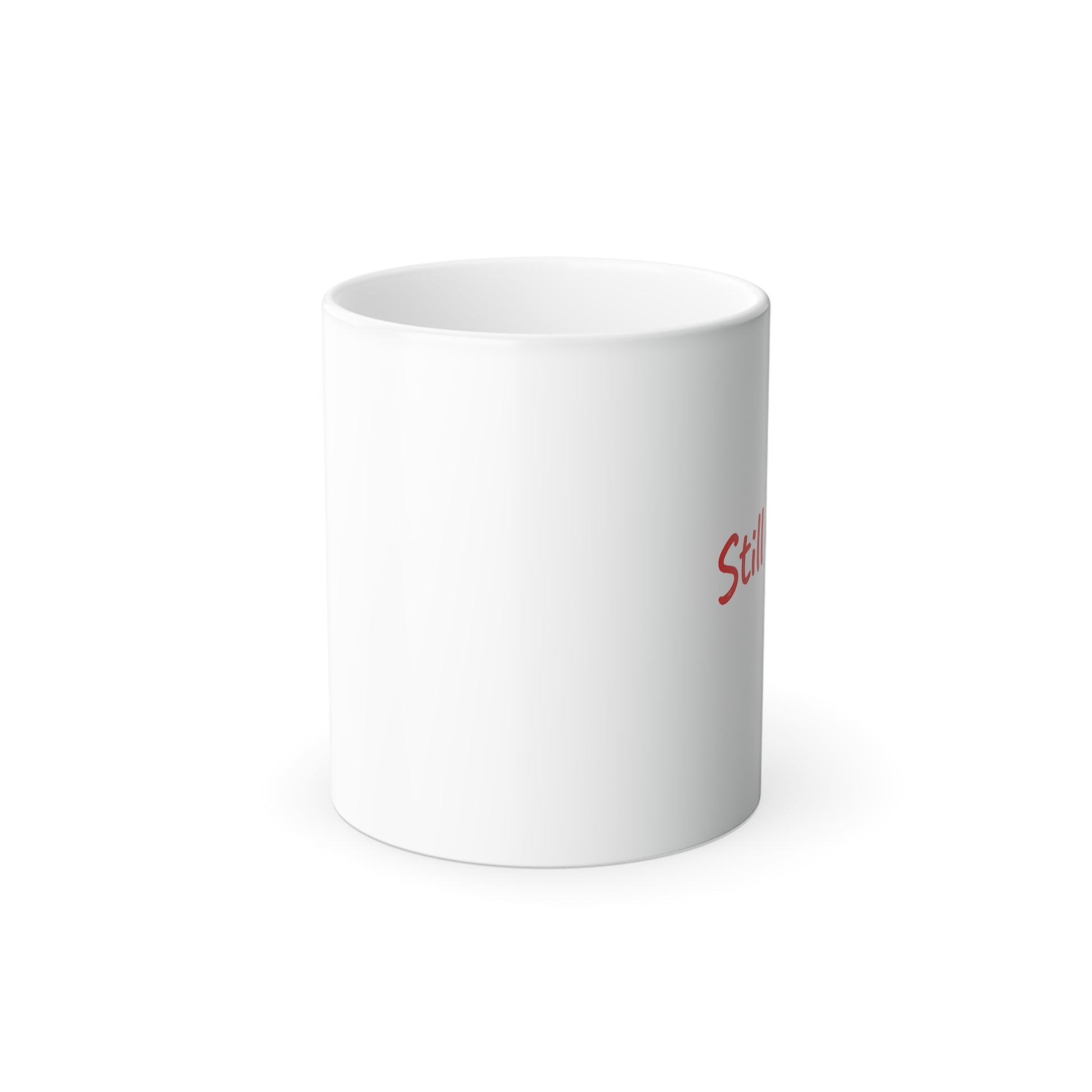 White mug with romantic words ‘Still loving you’  written in red text on a white background